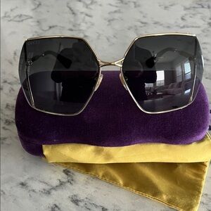 Gucci Women's Sunglasses - Gold Frame with Black Lenses